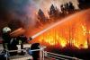 Hundreds of firefighters battle wildfire in Portugal burning for three days