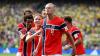 Norway's bold red jersey carries a profound tribute to centuries of Christian faith