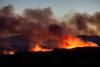 Thousands flee raging wildfires in southern Europe