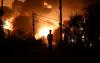 Massive wildfires tear through southern Europe forcing thousands to flee