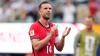 England player injures wrist hopping over ad board during team's World Cup victory celebration vs Mexico