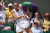Ukraine's Marta Kostyuk advances to Wimbledon quarterfinals as Roger Federer pays visit
