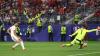 Merino strikes late as Spain edge out Portugal to advance