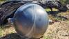 Six mysterious metal balls wash up on beach sparking official investigation