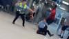Shock moment tourist lashes out at cops after going on rampage in top holiday airport as onlooker screams ‘stop it!’