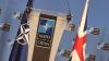 UK hand at NATO summit weakened by turmoil, experts say