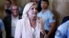 French court opens door for Marine Le Pen to run for president, with ankle monitor