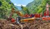 China landslide leaves at least five dead with 12 more trapped