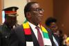 Zimbabwe’s 83-year-old president signs law to delay elections and extend his own term