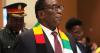Zimbabwe's 83-year-old president signs law to delay elections and extend his own term