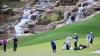 Golfers appear to launch cart off cliff and land in the water at course in Missouri designed by Tiger Woods
