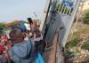 Metal gate on border bridge linking Dominican Republic and Haiti collapses