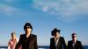 Watch U2 Crash a Family’s Apartment in New Music Video