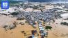 Seventeen dead, 900 snakes set loose as storms lash China