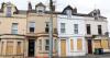 The Portadown street filled with boarded up homes after racist violence erupted across NI