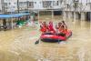 China floods kill 17 as rescuers search for survivors amid more storms