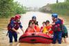 Rescuers search for survivors of China storms as super typhoon nears