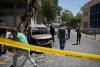 Syria says one killed, 36 wounded after Damascus blasts during Macron visit