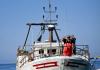 Sunken wrecks, hot seas threaten fishermen on Italian isle