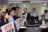 Lawmakers call for officials to resign over tainted cooking oil case