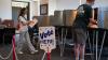 DOJ warns election officials of possible criminal charges over voter rolls