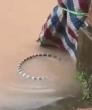 Horrifying videos show hundreds of snakes including venomous cobras plague flooded village after slithering out of farm