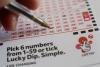 National Lottery player claims her £12m winning ticket was thrown in the bin