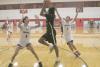Farmersville boys hoops team holds ground against two state champs