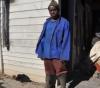 SOUTH AFRICAN  MAN BEATEN, IMMIGRANT WIFE JAILED
