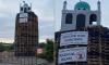 Fury over 'sickening and cowardly' bonfire in Northern Ireland with replica of mosque placed on top - as man is arrested