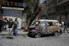 Syria says it arrested suspects behind the Damascus bombings during Macron's visit
