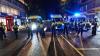 Riot police injured in central LONDON chaos while Paris celebrates peacefully after France beat Morocco