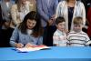 Ayotte Signs Child Care Tax Credit Backed by Business Leaders