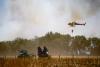 At least 12 people dead as wildfires spread through southern Spain