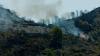 At least 12 killed as over 100 firefighters battle wildfires raging across southern Spain