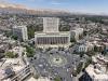 Syria says suspects arrested over Damascus blasts during Macron visit