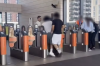 London Fare Dodgers Caught on Camera Walking Straight Through Ticket Barriers as Staff Stand By