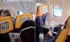 How Ryanair passenger who was sucked out of plane window was saved by his hero wife who held onto his feet for five minutes 
