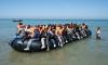 Migrants win High Court battle against one-in, one-out deal in massive blow to Mahmood scheme