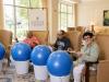 Music, movement keep residents active through cardio drumming at The Sinclair