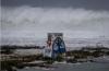 Destruction in the wake of Super Typhoon Bavi as it approaches East Asia