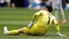 Belgium goalkeeper injured, leaves World Cup quarterfinal vs. Spain
