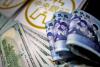 Taiwan dollar hits 14-month low on greenback gains, dividends