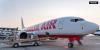 Man injured after being partly sucked out of broken window on a flight from Greece