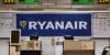 A man was partly sucked out of a broken window on a Ryanair plane shortly after takeoff, but fellow passengers pulled him back