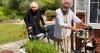 Care home residents enjoy gardening in the sunshine