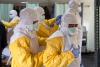 US citizen tests positive for Ebola as officials work to figure out treatment plan