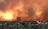 Two British tourists trapped in deadly wildfire in Spain are found alive 'with 40 per cent burns' after police heard 'very faint sound'