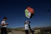 Palestinians fly kites over lands stolen by illegal Israeli settlers