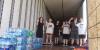 Athens City Schools marching band kicks off season with community water collection drive